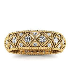 Wieczny blask - Ażurowy pierścionek z żółtego złota z diamentami