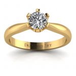 Szykowny minimalizm - Klasyczny pierścionek zaręczynowy z żółtego złota z brylantem