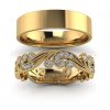 Orientalny szyk - Obrączki ślubne z żółtego złota z diamentami