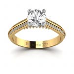 Piękna linia - Pierścionek zaręczynowy z białego i żółtego złota z białym szafirem i diamentami