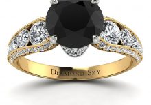 Majestatyczne piękno - Pierścionek z dwukolorowego złota z czarnym diamentem i brylantami
