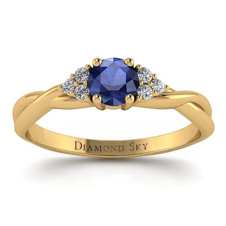 Subtelna harmonia - Pierścionek zaręczynowy z żółtego złota z szafirem i diamentami