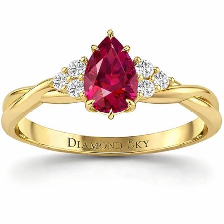 Subtelna harmonia - Pierścionek zaręczynowy z żółtego złota z rubinem o szlifie łezka i diamentami