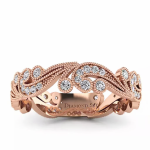 Orientalny szyk - Ażurowa obrączka ślubna z różowego złota z diamentami