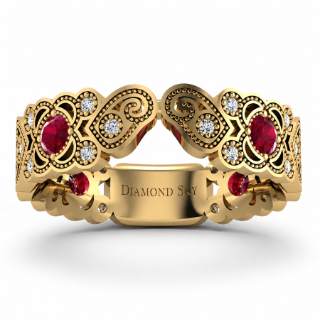 Ażurowa obrączka z żółtego złota z rubinami i diamentami – wzorzyste piękno